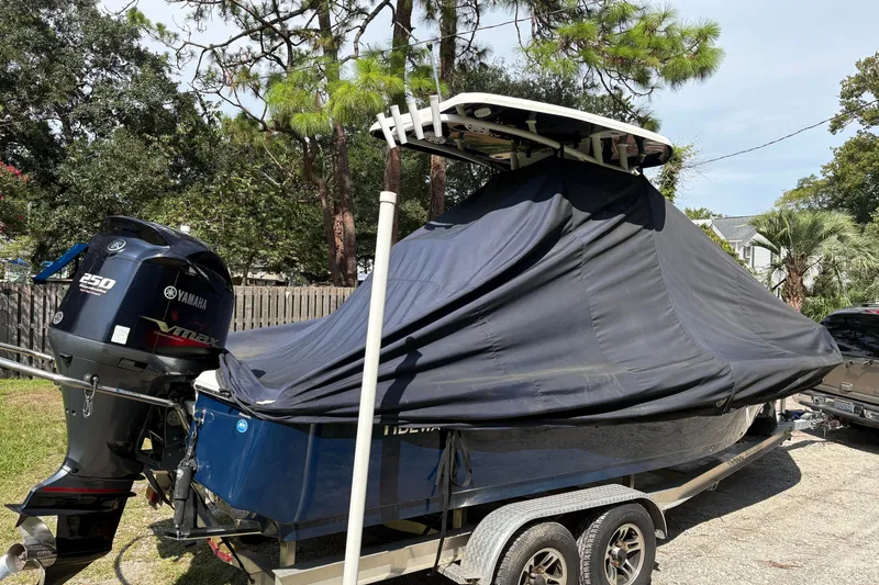 Slide: The Image of 2019 Tidewater 2200 Carolina Bay boat covered on trailer with Yamaha 250 engine. - 46