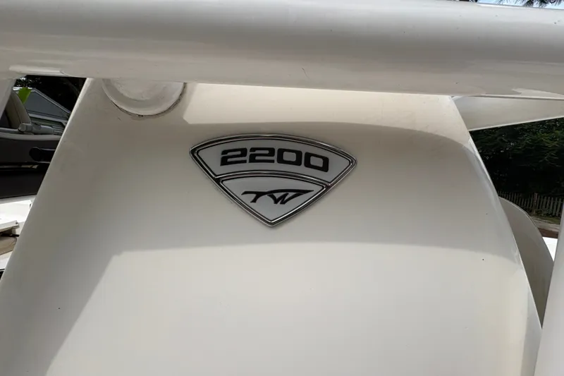 Slide: The Image of 2019 Tidewater 2200 Carolina Bay boat emblem on white surface. - 32