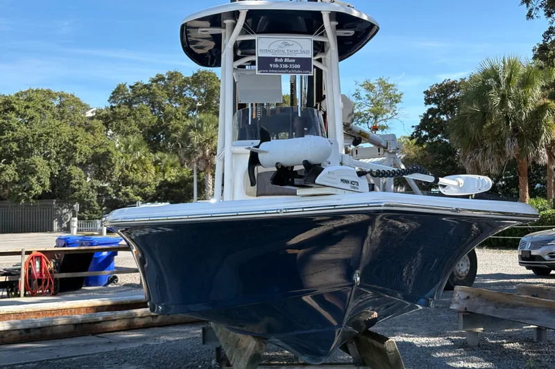Slide: The Image of 2019 Tidewater 2200 Carolina Bay boat on display, featuring a sleek design and modern equipment. - 13