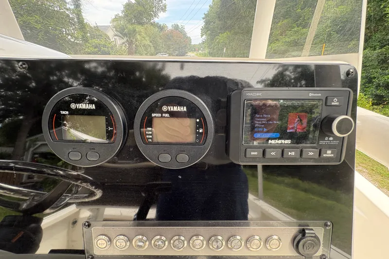 Slide: The Image of Dashboard of 2019 Tidewater 2200 Carolina Bay with Yamaha gauges and Memphis audio system. - 24