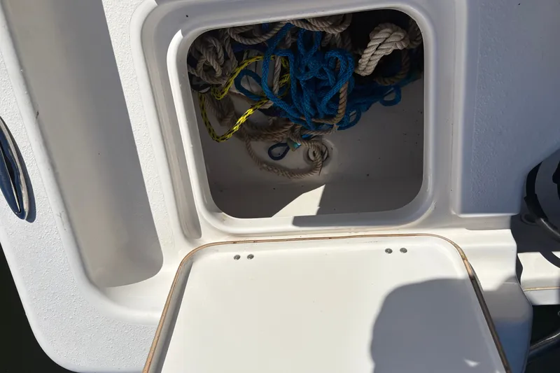 Slide: The Image of Storage compartment with ropes on a 2019 Tidewater 2200 Carolina Bay boat. - 44