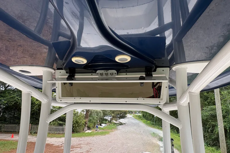 Slide: The Image of 2019 Tidewater 2200 Carolina Bay boat's T-top with integrated lights and electronics. - 28