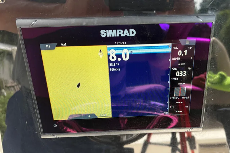 Slide: The Image of Simrad display on 2019 Tidewater 2200 Carolina Bay showing sonar and navigation data. - 23