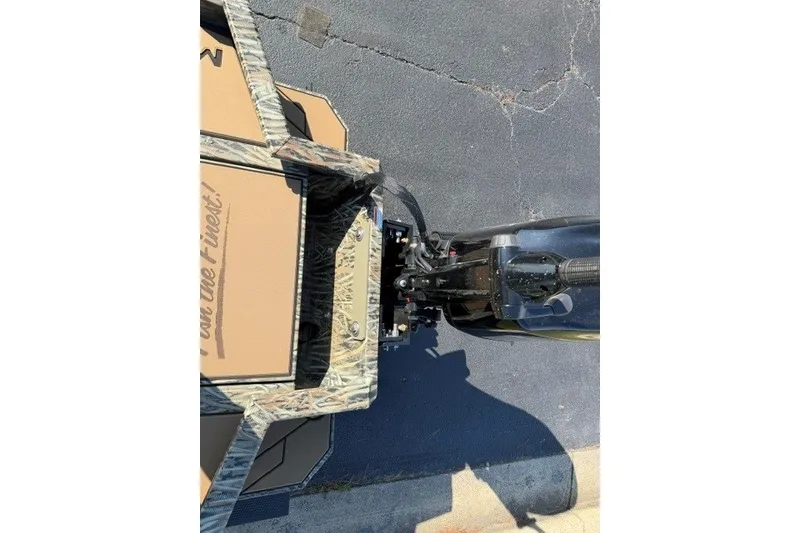 Slide: The Image of Overhead view of 2027 Tracker Grizzly 1756 T Marsh boat with camouflage design. - 78