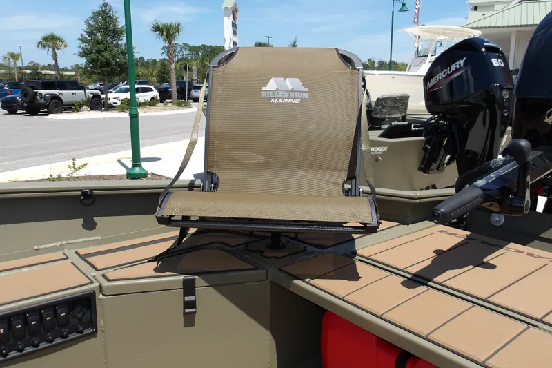Slide: The Image of 2027 Tracker Grizzly 1553 Timber boat with Millennium Marine seat and Mercury engine. - 19