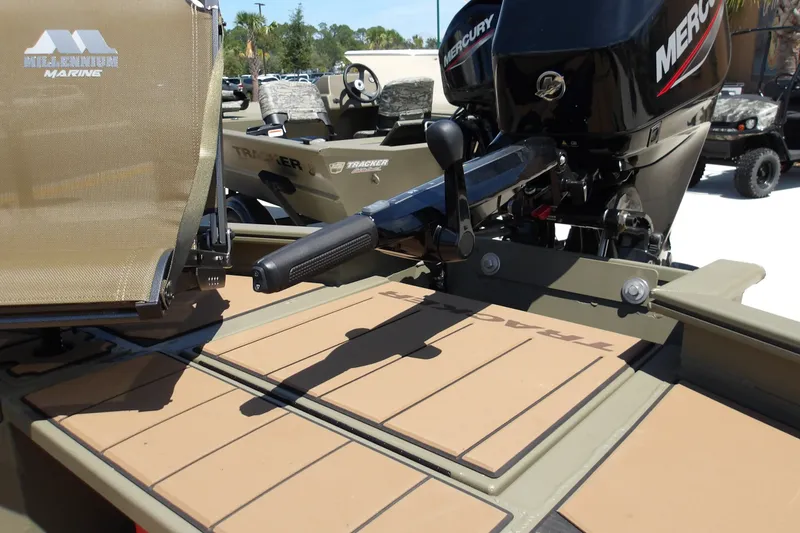 Slide: The Image of 2027 Tracker Grizzly 1553 Timber boat with Mercury outboard motor and Millennium Marine seat. - 20