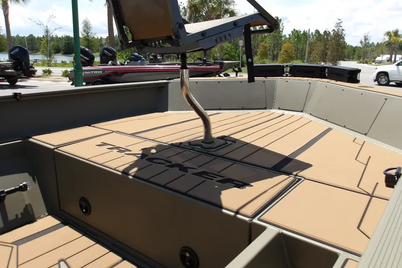 Slide: The Image of 2027 Tracker Grizzly 1553 Timber boat interior with seating and deck details. - 15