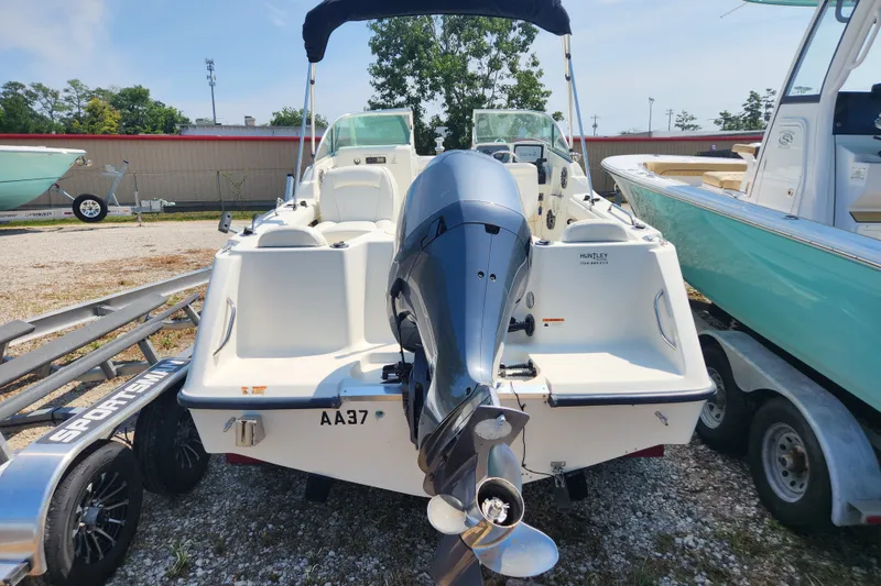 Slide: The Image of 2004 Hydra-Sports Lightning 202 DC boat with outboard motor on trailer. - 19