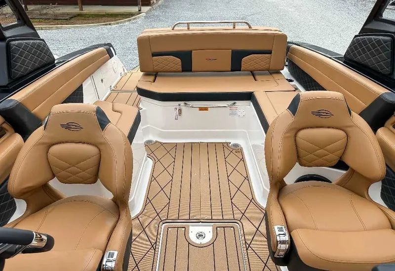 Slide: The Image of Interior of a 2026 Chaparral GTS 6 with sleek brown leather seats and modern design. - 20