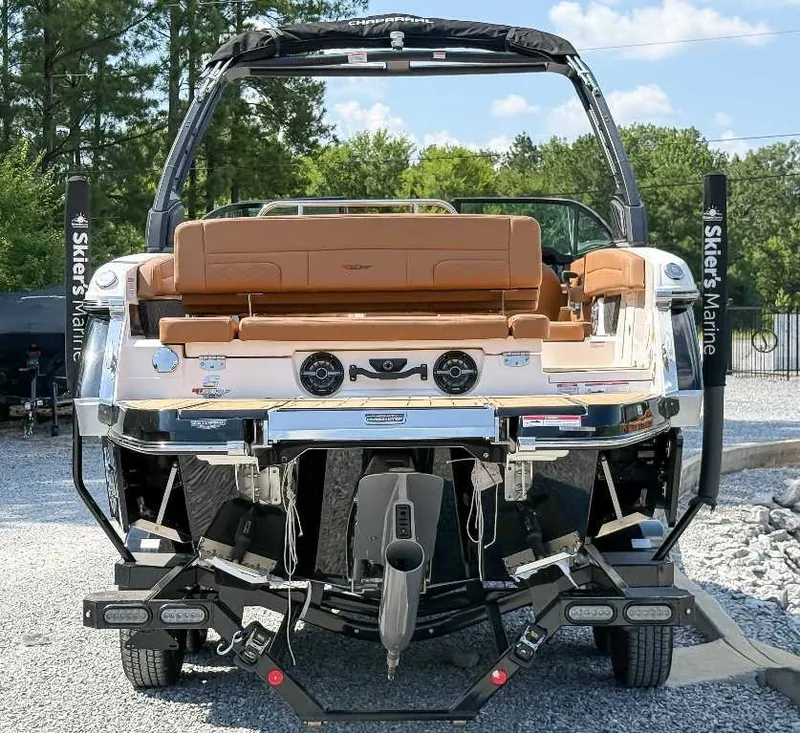 Slide: The Image of The image shows the rear of a 2026 Chaparral GTS 6. It features a sleek design with a brown seating area and modern details. - 8