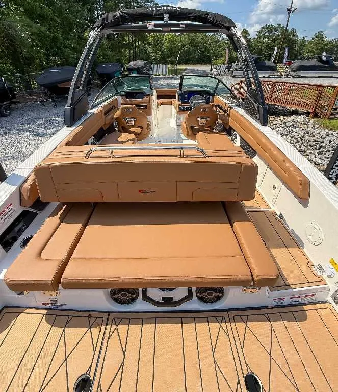 Slide: The Image of 2026 Chaparral GTS 6 with luxurious brown leather seating and modern cockpit design. - 9