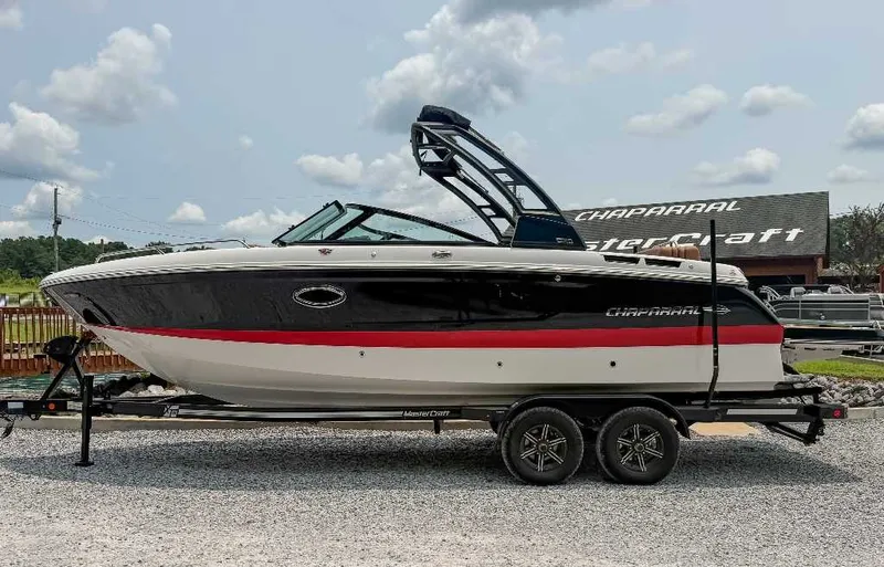 The Image of 2026 Chaparral SSX 6 on a trailer, featuring sleek design and distinctive color scheme. - 1