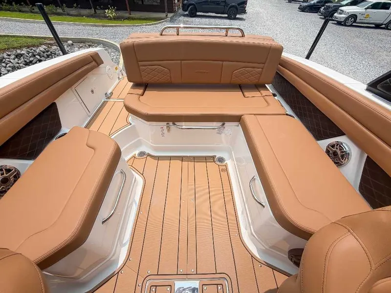 Slide: The Image of The image shows the interior of a 2026 Chaparral SSX 6 with elegant brown leather seating. - 23
