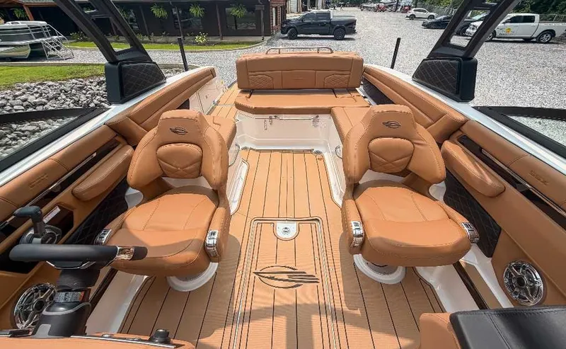 Slide: The Image of The image shows the cockpit of a 2026 Chaparral SSX 6 with luxurious leather seating. - 18