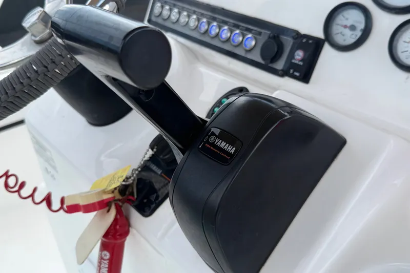 Slide: The Image of Close-up of Yamaha throttle control on 2020 Tidewater 2110 Bay Max boat dashboard. - 21
