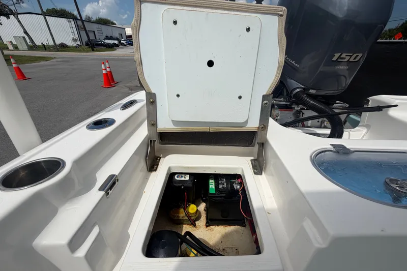 Slide: The Image of 2020 Tidewater 2110 Bay Max boat battery compartment with Yamaha 150 engine. - 51