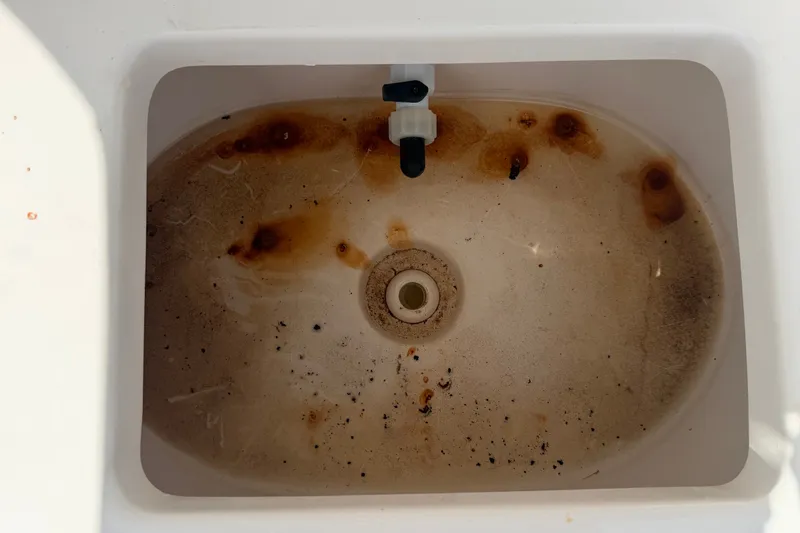 Slide: The Image of Dirty livewell interior of 2020 Tidewater 2110 Bay Max boat. - 44