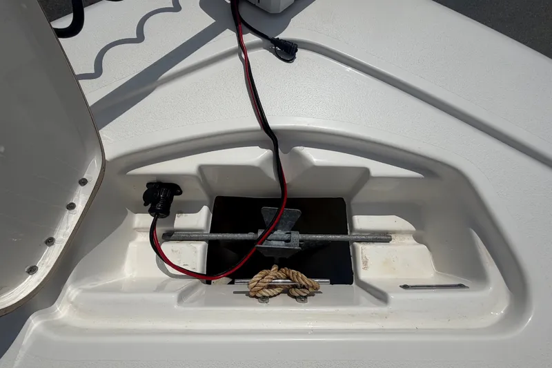 Slide: The Image of Anchor compartment of a 2020 Tidewater 2110 Bay Max with anchor and rope. - 36