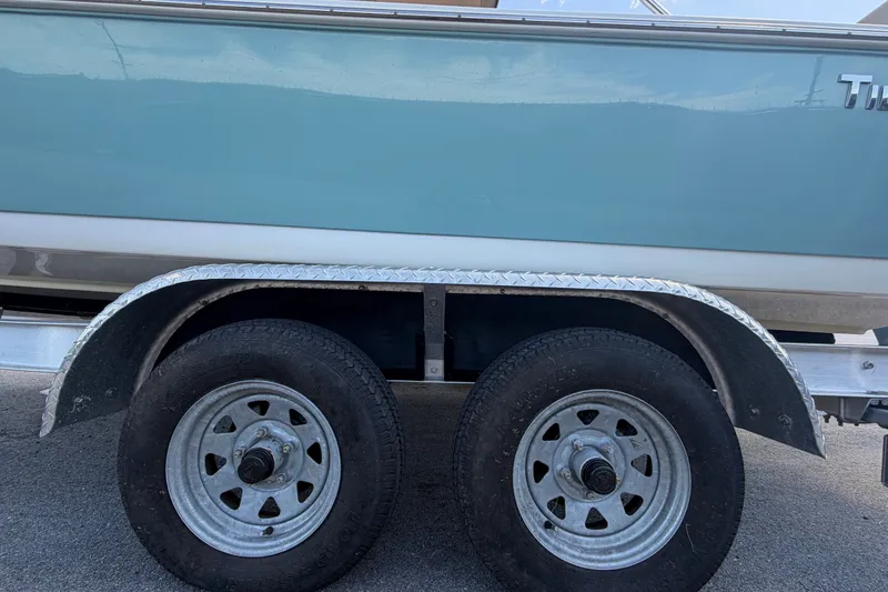 Slide: The Image of 2020 Tidewater 2110 Bay Max boat on trailer, side view with dual wheels. - 65
