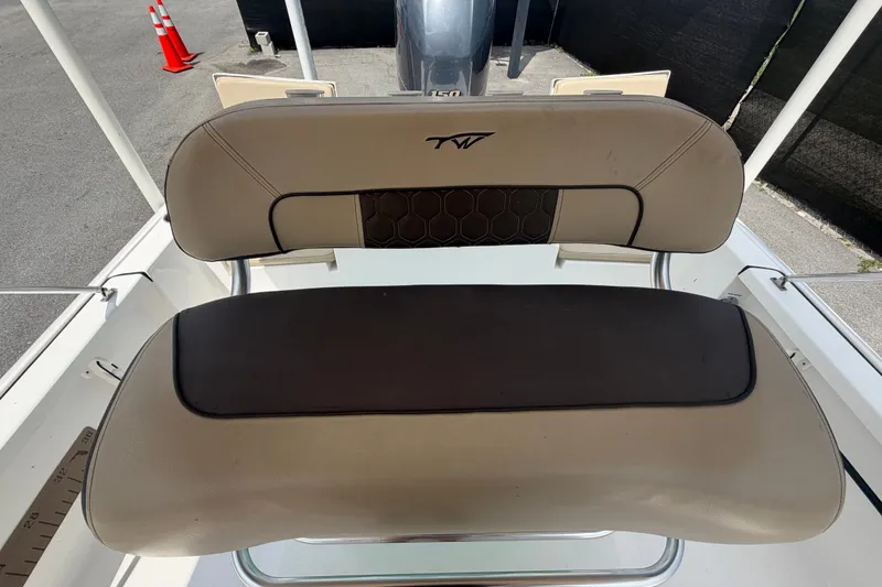 Slide: The Image of 2020 Tidewater 2110 Bay Max boat seat with beige and black upholstery. - 47