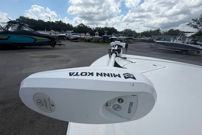 Slide: The Image of Minn Kota Riptide motor on 2020 Tidewater 2110 Bay Max boat under cloudy sky. - 38