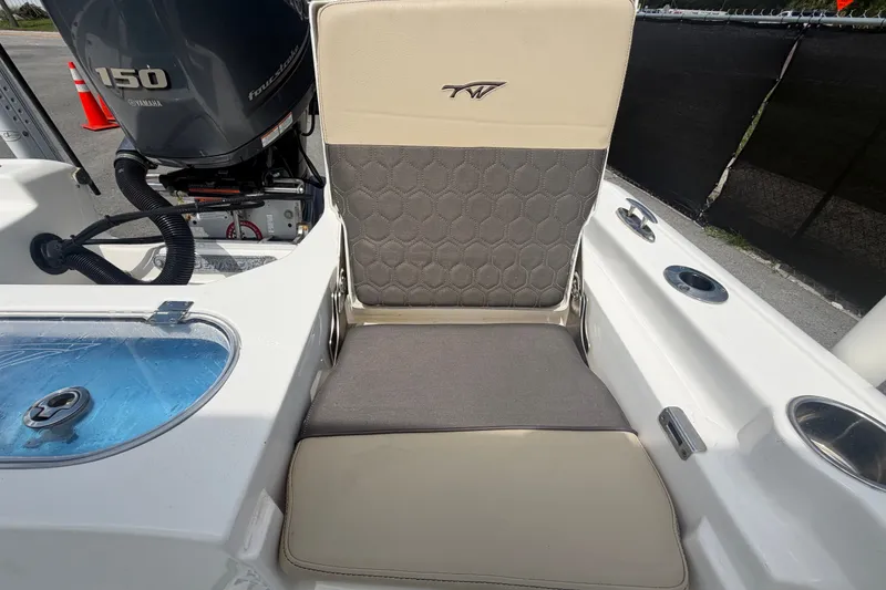 Slide: The Image of 2020 Tidewater 2110 Bay Max boat seat with Yamaha 150 engine in background. - 55