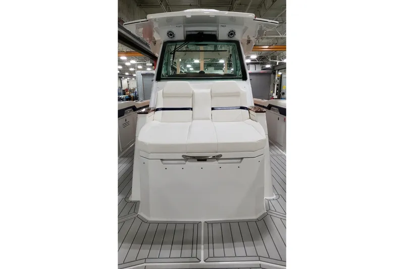 Slide: The Image of 2026 Formula 387 Center Console Fish boat interior with cushioned seating and modern design. - 15