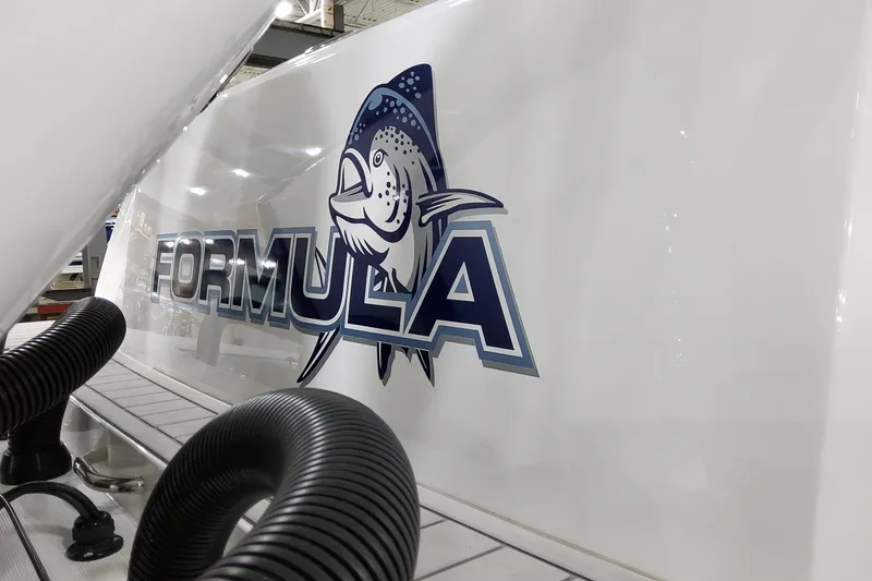 Slide: The Image of 2026 Formula 387 Center Console Fish boat logo with fish graphic. - 10