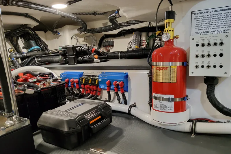 Slide: The Image of Engine room of 2026 Formula 387 Center Console Fish with safety equipment and wiring. - 31