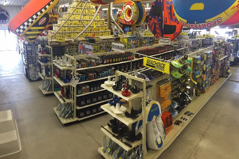 Slide: The Image of Boat supply store with various marine accessories and equipment on display. - 14