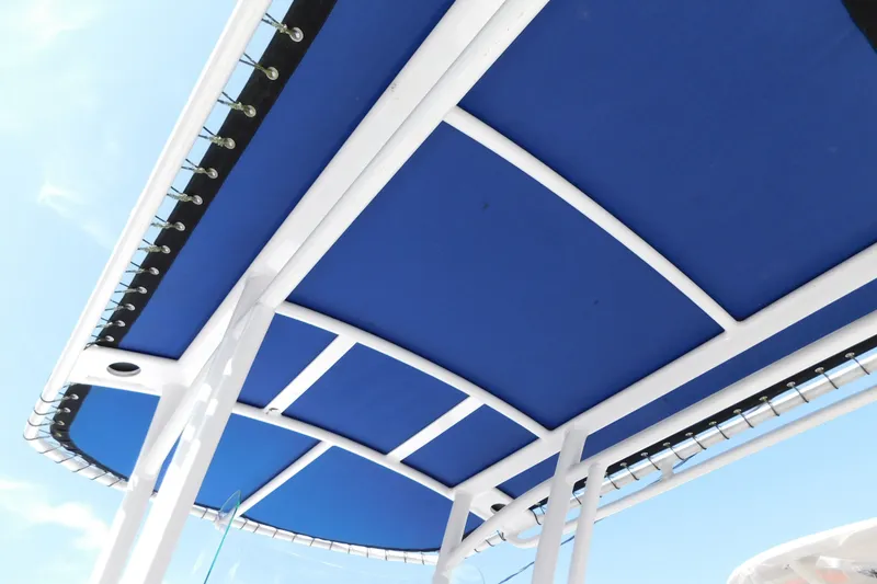 Slide: The Image of Blue canopy of 2021 Sea Fox 228 Commander boat against clear sky. - 10