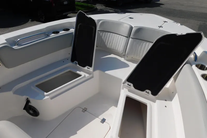 Slide: The Image of 2021 Sea Fox 228 Commander boat interior with open storage compartments. - 11