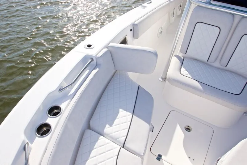 Slide: The Image of Manufacturer Provided Image: 2021 Sea Fox 228 Commander boat interior with cushioned seating and cup holders. - 33