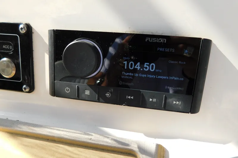 Slide: The Image of Fusion marine stereo on 2021 Sea Fox 228 Commander boat dashboard. - 20