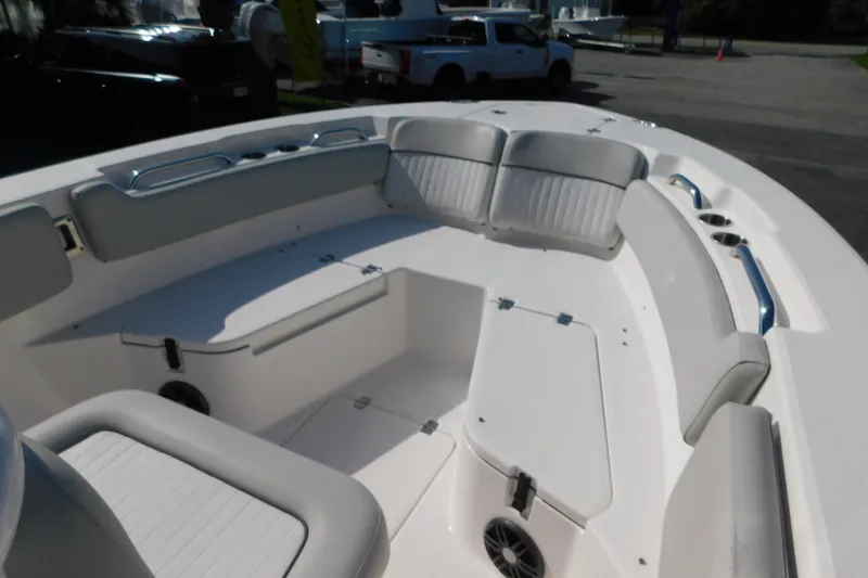 Slide: The Image of 2021 Sea Fox 228 Commander boat interior with cushioned seating and storage compartments. - 21