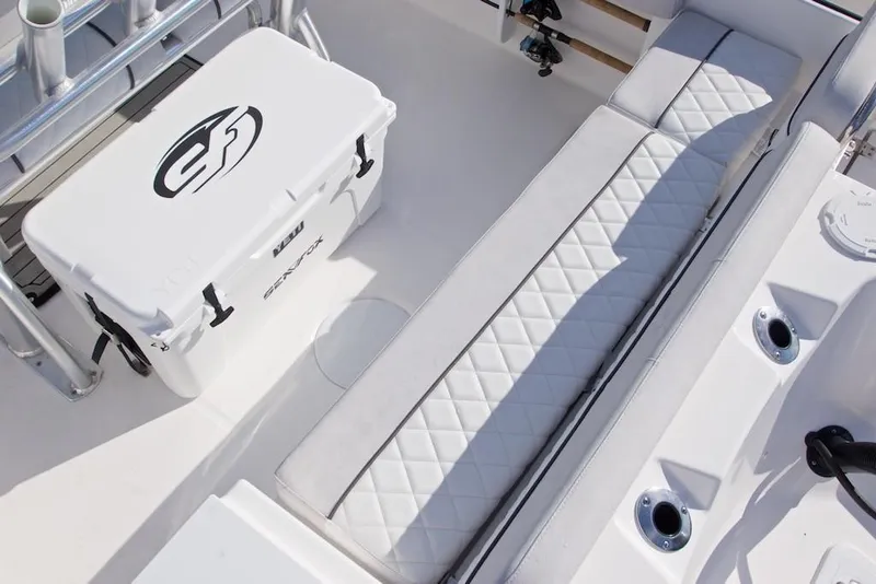 Slide: The Image of Manufacturer Provided Image: 2021 Sea Fox 228 Commander boat interior with cushioned seating and branded cooler. - 30