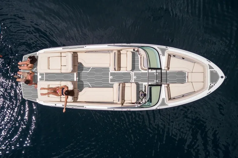 Slide: The Image of Manufacturer Provided Image: 2022 Regal LS6 boat with sunbathers on deck, aerial view. - 27