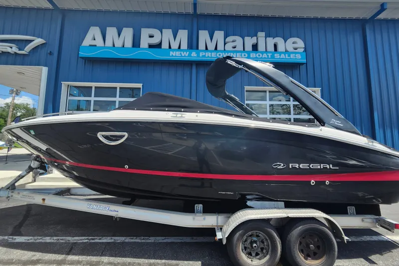 The Image of 2022 Regal LS6 boat on trailer at AM PM Marine dealership. - 0
