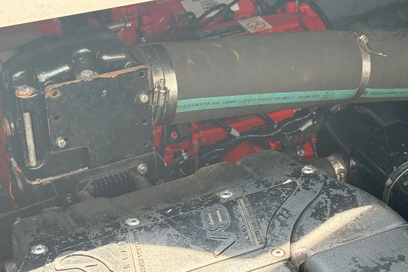Slide: The Image of Engine compartment of a 2001 Sea Ray 380 Sundancer boat, showing mechanical components. - 6