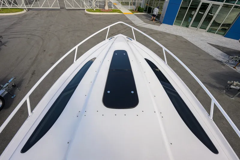 Slide: The Image of Top view of 2022 Intrepid 409 Valor boat, showcasing sleek design and spacious deck. - 10