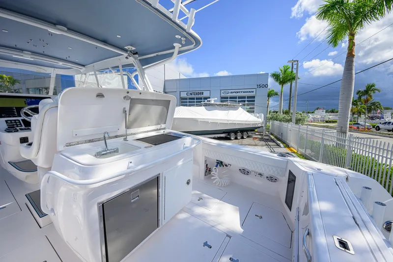 Slide: The Image of 2022 Intrepid 409 Valor yacht with sleek deck design and modern amenities. - 40
