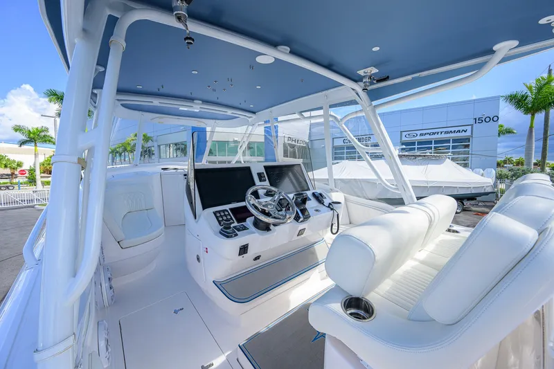 Slide: The Image of Interior view of 2022 Intrepid 409 Valor boat with modern helm and seating. - 15