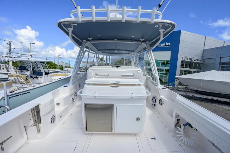 Slide: The Image of 2022 Intrepid 409 Valor boat interior at a yacht sales dealership. - 38
