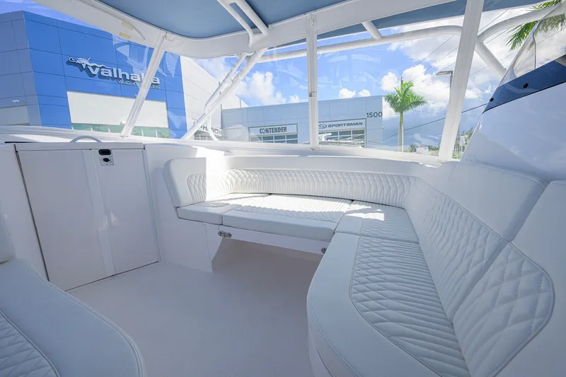 Slide: The Image of Luxurious interior of 2022 Intrepid 409 Valor yacht with white seating and modern design. - 24