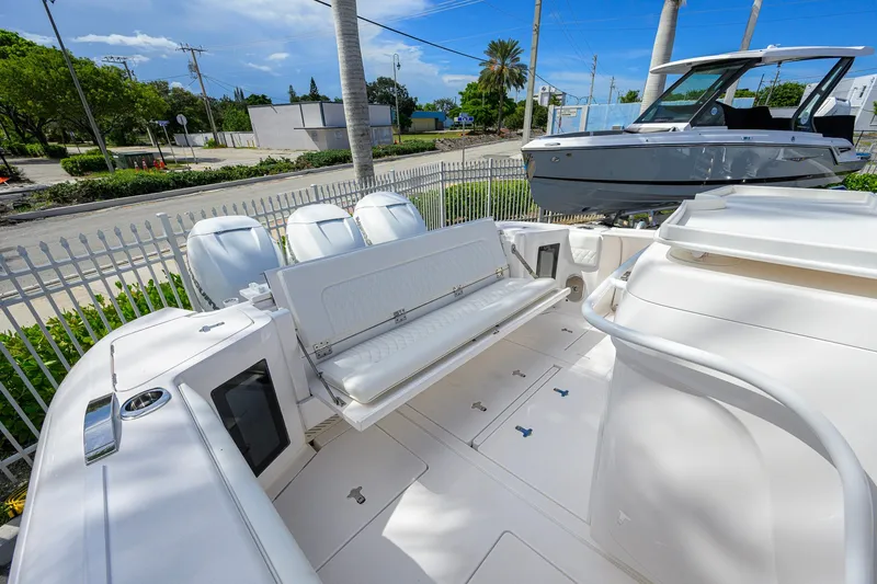 Slide: The Image of 2022 Intrepid 409 Valor boat with spacious seating and sleek design. - 34