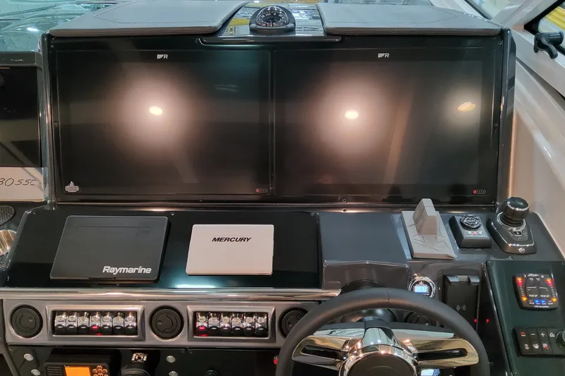 Slide: The Image of Dashboard of 2027 Formula 430 Super Sport Crossover with Raymarine and Mercury controls. - 17