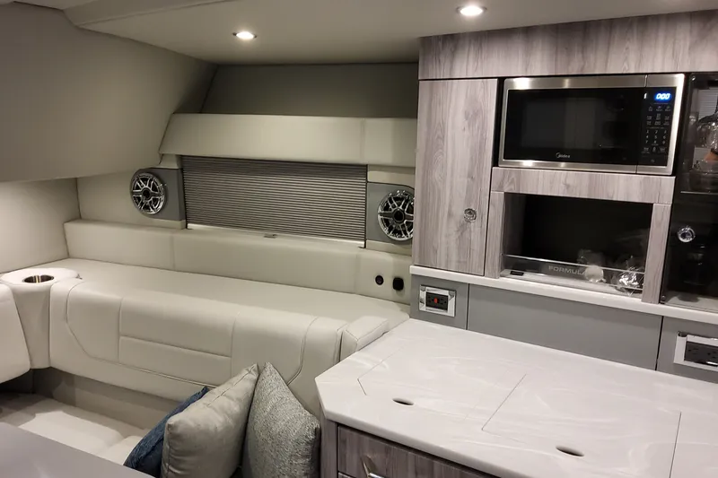 Slide: The Image of Luxurious interior of 2027 Formula 430 Super Sport Crossover with modern amenities. - 26