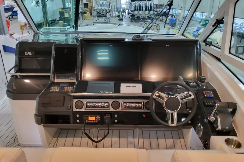 Slide: The Image of Dashboard of 2027 Formula 430 Super Sport Crossover with advanced navigation systems. - 18