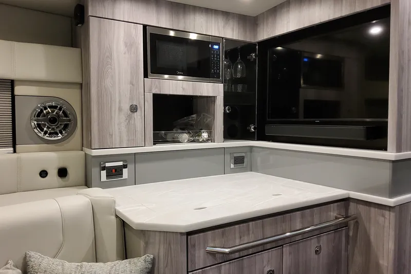 Slide: The Image of Luxurious interior of 2027 Formula 430 Super Sport Crossover with modern amenities and sleek design. - 27