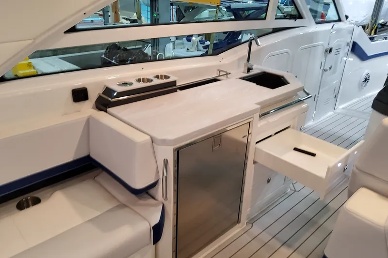 Slide: The Image of Interior of 2027 Formula 430 Super Sport Crossover yacht with sleek kitchen amenities. - 15